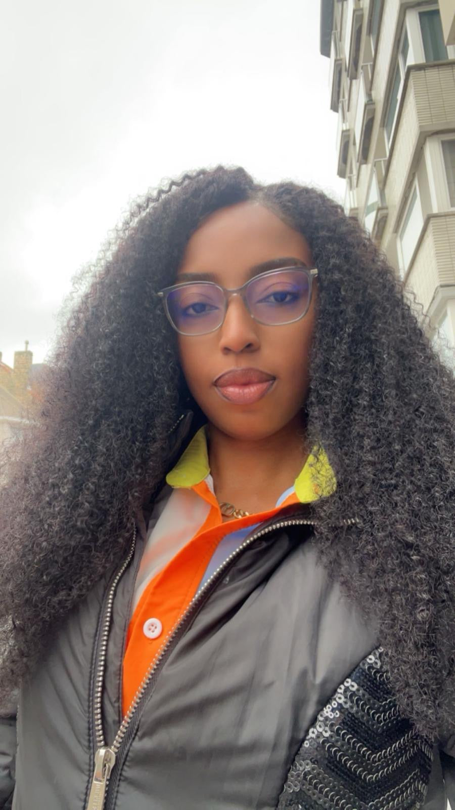 Raw Afro Curly Clip-Ins (100% human hair).